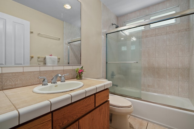 2364-C Hulemalu Rd, Lihue, HI 96766 - full bath with vanity, shower / bath combination with glass door, tile patterned floors, and decorative backsplash