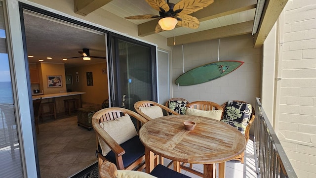 76-6246 Alii Dr Unit 324, Kailua-Kona, HI 96740 - balcony featuring a ceiling fan and outdoor dining space