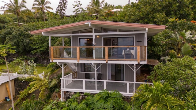 87-3216 Carissa Rd, Captain Cook, HI 96704 - rear view of property featuring a balcony and a sunroom
