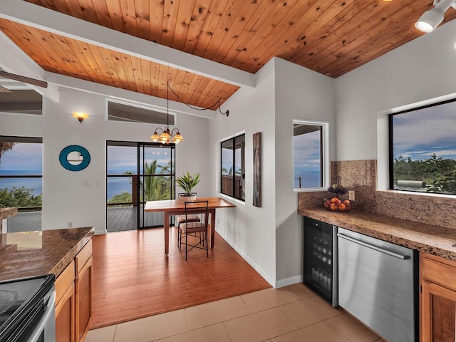 87-3216 Carissa Rd, Captain Cook, HI 96704 - kitchen with stainless steel appliances, wine cooler, light tile patterned floors, healthy amount of natural light, and wood ceiling