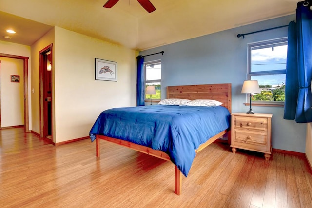 39 Kula Pl Unit 1, Hilo, HI 96720 - bedroom with wood finished floors and ceiling fan