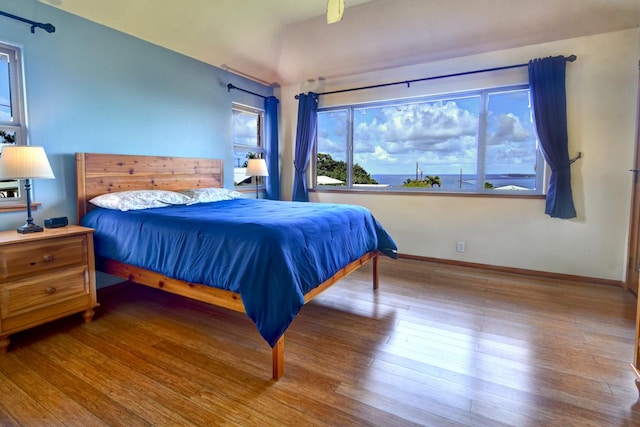 39 Kula Pl Unit 1, Hilo, HI 96720 - bedroom with wood finished floors and baseboards