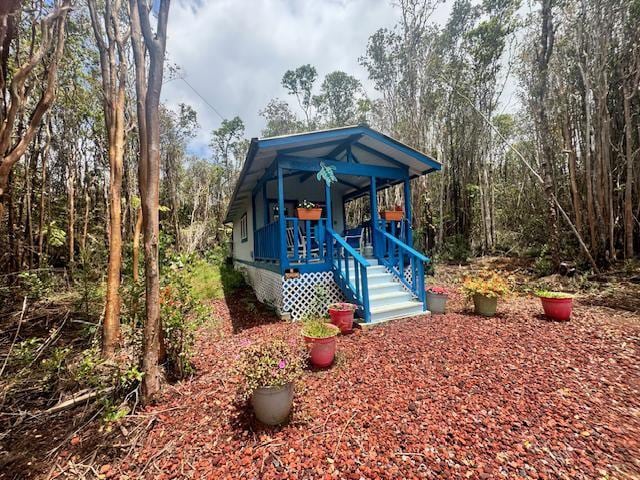 18-2026 Mahena St, Volcano, HI 96785 - view of front of house with covered porch