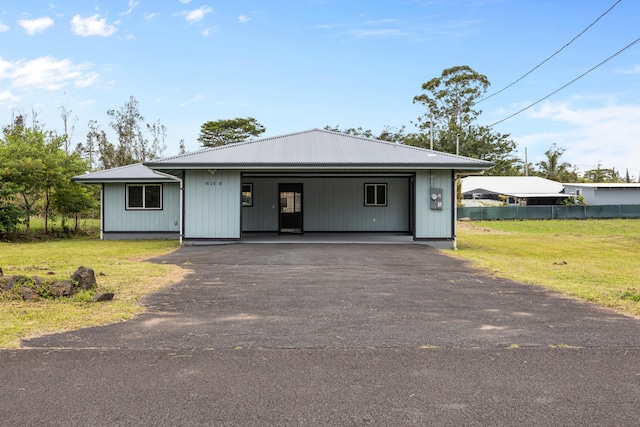 16-2098 Pikake Dr, Pahoa, HI 96778 - view of front of home with a metal roof and driveway