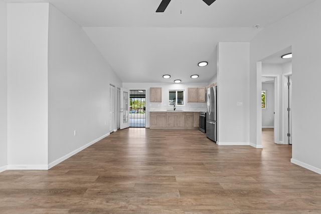 16-2098 Pikake Dr, Pahoa, HI 96778 - unfurnished living room featuring a ceiling fan, light wood-type flooring, vaulted ceiling, and recessed lighting