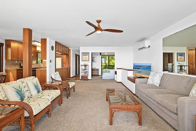 1870 Hoone Rd Unit 511, Koloa, HI 96756 - living room featuring a wall mounted AC, ceiling fan, and light colored carpet