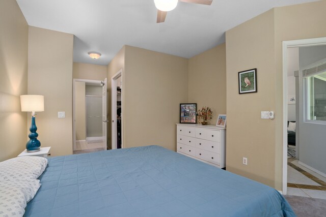 2110 Kaneka St Unit 46, Lihue, HI 96766 - tiled bedroom featuring a ceiling fan and baseboards