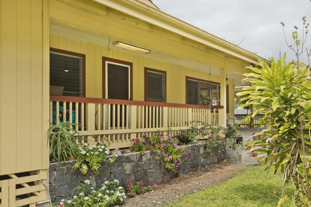 16-295 Orchidland Dr, Kurtistown, HI 96760 - view of property exterior featuring a porch