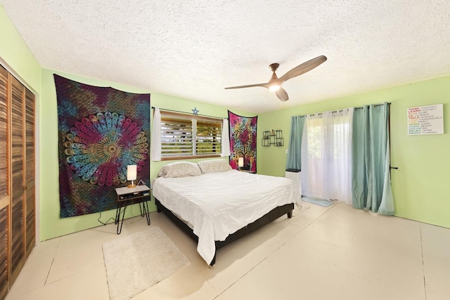 16-295 Orchidland Dr, Kurtistown, HI 96760 - bedroom with multiple windows, a textured ceiling, a ceiling fan, and a closet