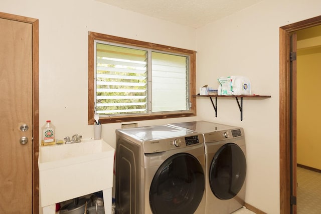 16-295 Orchidland Dr, Kurtistown, HI 96760 - laundry room with independent washer and dryer and a textured ceiling