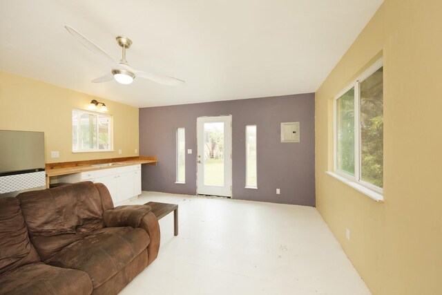 16-295 Orchidland Dr, Kurtistown, HI 96760 - living room featuring concrete floors and a ceiling fan