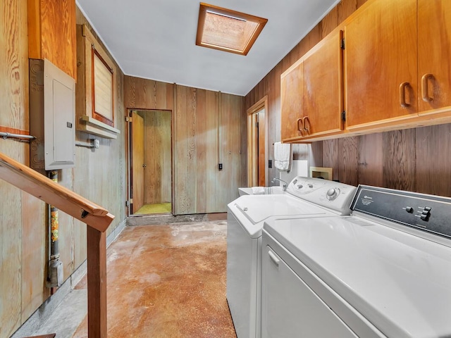196 Iwalani St, Hilo, HI 96720 - laundry room featuring electric panel, cabinet space, washer and dryer, and wood walls