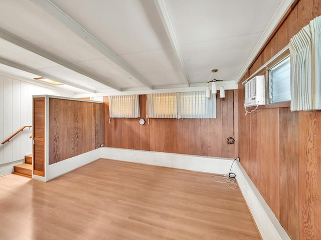 196 Iwalani St, Hilo, HI 96720 - basement featuring wood finished floors, stairs, a wall mounted AC, and wood walls