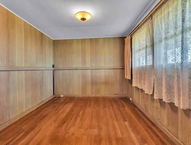 196 Iwalani St, Hilo, HI 96720 - empty room with wood finished floors and wood walls