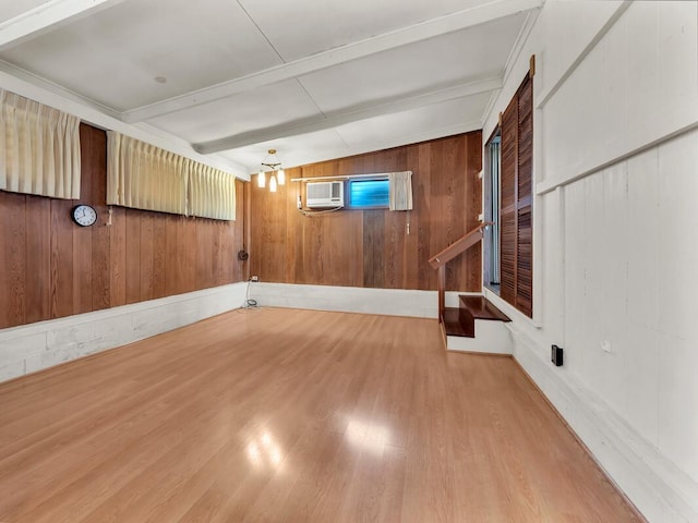 196 Iwalani St, Hilo, HI 96720 - basement with wood finished floors, wood walls, and an AC wall unit
