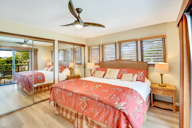 1901 Poipu Rd Unit 824, Koloa, HI 96756 - bedroom with wood finished floors, access to outside, two closets, and a ceiling fan