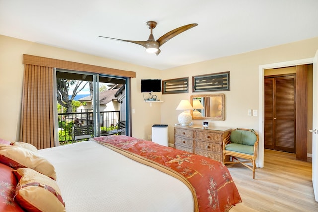 1901 Poipu Rd Unit 824, Koloa, HI 96756 - bedroom featuring access to exterior, light wood-type flooring, and a ceiling fan