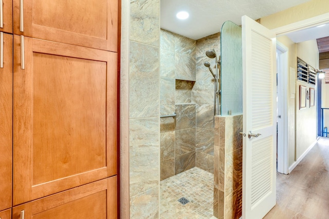 1901 Poipu Rd Unit 824, Koloa, HI 96756 - bathroom featuring walk in shower and wood finished floors