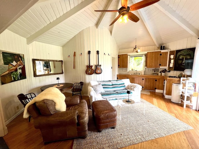 15-1884 9th Ave, Keaau, HI 96749 - living area featuring light wood-style flooring, ceiling fan, wood ceiling, and wooden walls