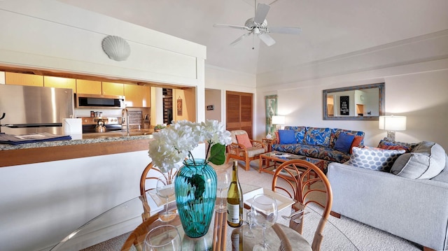 2253 Poipu Rd Unit 218, Koloa, HI 96756 - living room featuring ceiling fan and vaulted ceiling