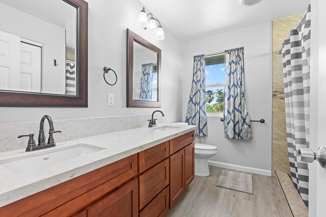 15-1730 29th Ave, Keaau, HI 96749 - bathroom featuring wood finished floors and double vanity