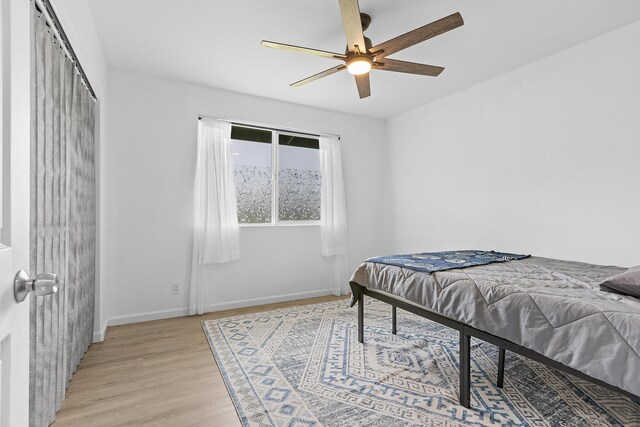 15-1730 29th Ave, Keaau, HI 96749 - bedroom with light wood-style flooring and a ceiling fan