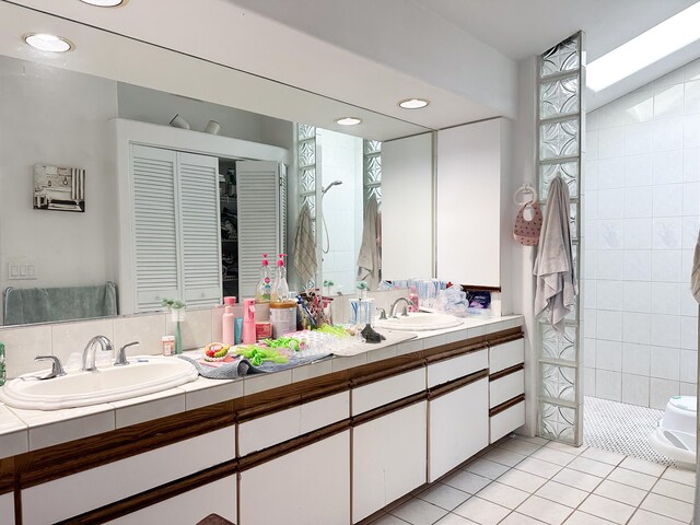 76-6303 Haku Pl, Kailua-Kona, HI 96740 - bathroom with tile patterned floors, double vanity, and a tile shower