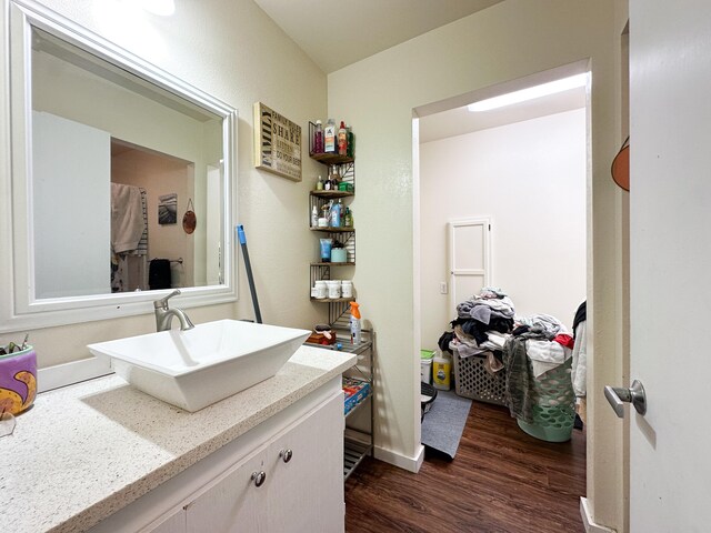 76-6303 Haku Pl, Kailua-Kona, HI 96740 - bathroom featuring wood finished floors and vanity