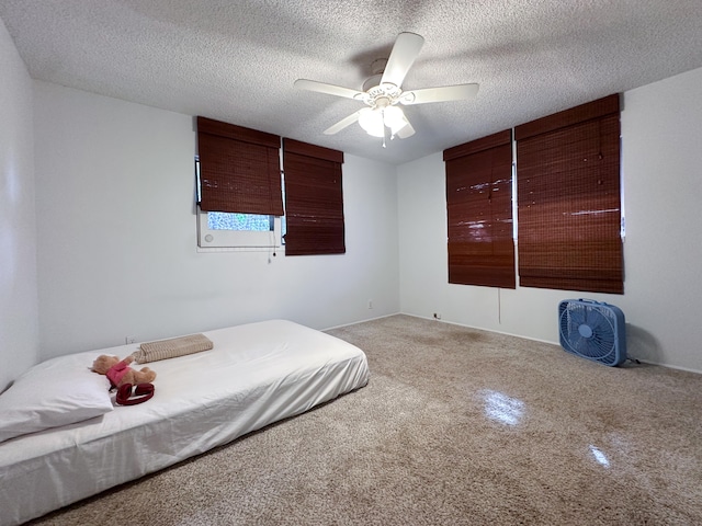 76-6303 Haku Pl, Kailua-Kona, HI 96740 - carpeted bedroom featuring a textured ceiling and ceiling fan