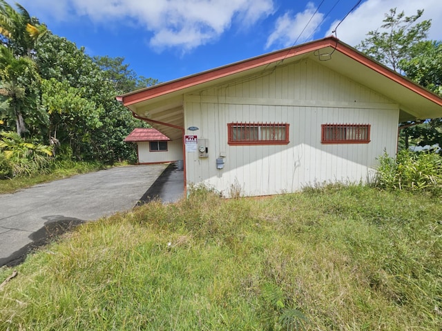 17-233 Ipuaiwaha St, Keaau, HI 96749 - view of front of house with driveway