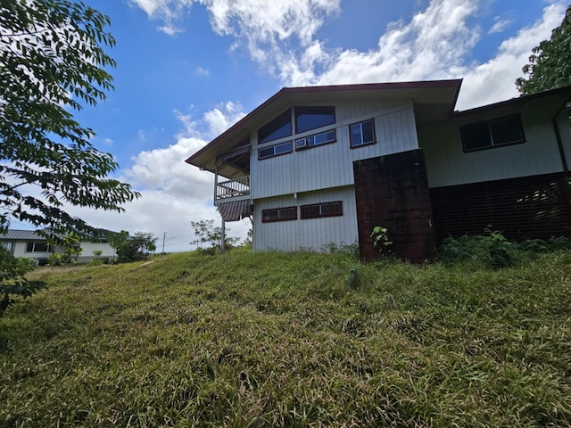 17-233 Ipuaiwaha St, Keaau, HI 96749 - back of house featuring a balcony