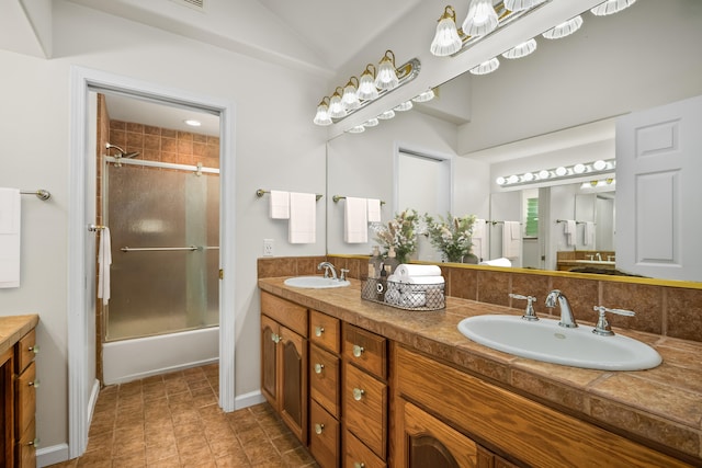 2895 Wawae Rd, Kalaheo, HI 96741 - full bathroom featuring double vanity, combined bath / shower with glass door, backsplash, and lofted ceiling