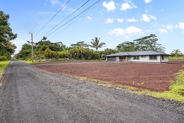 15-1408 13th Ave, Keaau, HI 96749 - view of front facade featuring a metal roof