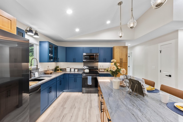 15-1408 13th Ave, Keaau, HI 96749 - kitchen featuring stainless steel appliances, blue cabinetry, vaulted ceiling, light stone counters, and glass insert cabinets