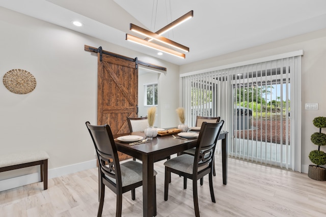 15-1408 13th Ave, Keaau, HI 96749 - dining room featuring a barn door, healthy amount of natural light, recessed lighting, lofted ceiling, and light wood finished floors