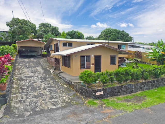 81-6356 Keopuka Pl, Captain Cook, HI 96750 - view of front facade featuring asphalt driveway and a carport