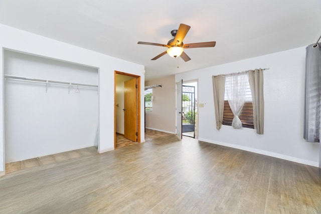 81-6356 Keopuka Pl, Captain Cook, HI 96750 - unfurnished bedroom with wood finished floors, a closet, and a ceiling fan