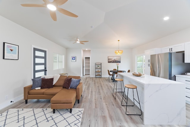 15-1713 32nd Ave, Keaau, HI 96749 - living room with ceiling fan, light wood finished floors, lofted ceiling, and recessed lighting