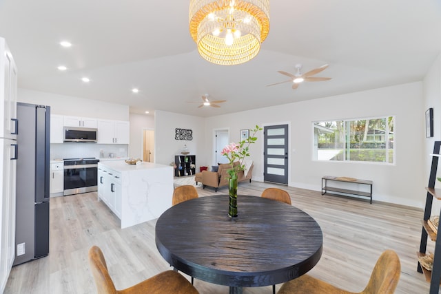 15-1713 32nd Ave, Keaau, HI 96749 - dining room featuring a ceiling fan, light wood-style flooring, recessed lighting, a chandelier, and vaulted ceiling