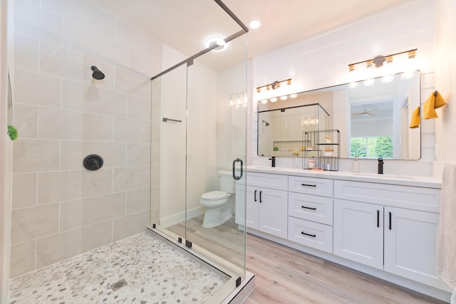 15-1713 32nd Ave, Keaau, HI 96749 - full bath featuring a shower stall, double vanity, wood finished floors, and ceiling fan