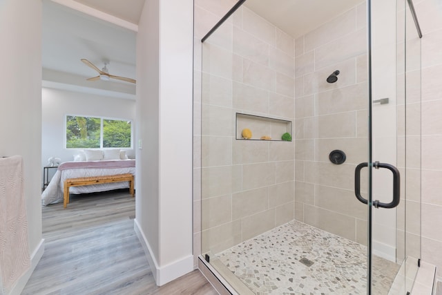 15-1713 32nd Ave, Keaau, HI 96749 - ensuite bathroom with a shower stall, wood finished floors, and ceiling fan