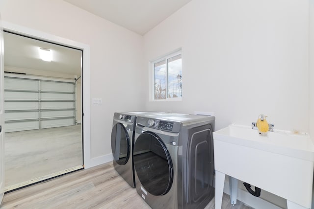 15-1713 32nd Ave, Keaau, HI 96749 - washroom featuring washer and dryer and light wood-style flooring