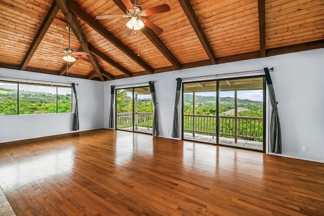 4460 Kai Ikena Dr, Kalaheo, HI 96741 - spare room with a wood ceiling with exposed beams, a ceiling fan, wood finished floors, plenty of natural light, and high vaulted ceiling