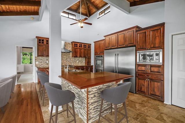 4460 Kai Ikena Dr, Kalaheo, HI 96741 - kitchen featuring built in appliances, a wood ceiling with exposed beams, high vaulted ceiling, wall chimney range hood, and tasteful backsplash