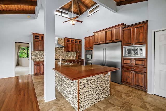 4460 Kai Ikena Dr, Kalaheo, HI 96741 - kitchen with built in appliances, a wood ceiling with exposed beams, high vaulted ceiling, wall chimney range hood, and backsplash