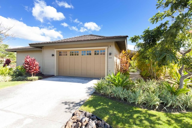 68-1122 Kaniku Dr Unit 426, Kamuela, HI 96743 - view of front of home featuring an attached garage and driveway