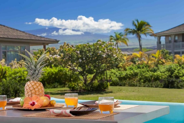 68-1122 Kaniku Dr Unit 426, Kamuela, HI 96743 - view of swimming pool featuring a patio area and a lawn