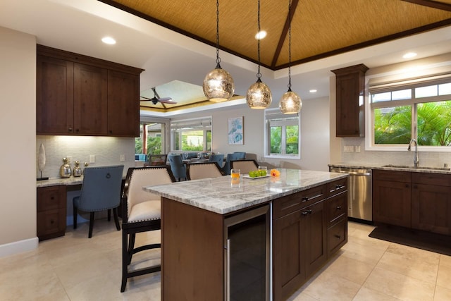 68-1122 Kaniku Dr Unit 426, Kamuela, HI 96743 - kitchen featuring wine cooler, stainless steel dishwasher, wooden ceiling, decorative backsplash, and a tray ceiling