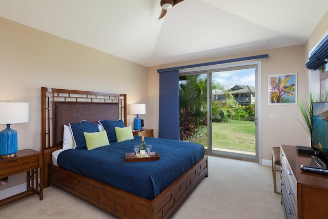 68-1122 Kaniku Dr Unit 426, Kamuela, HI 96743 - bedroom featuring access to exterior, light carpet, and vaulted ceiling