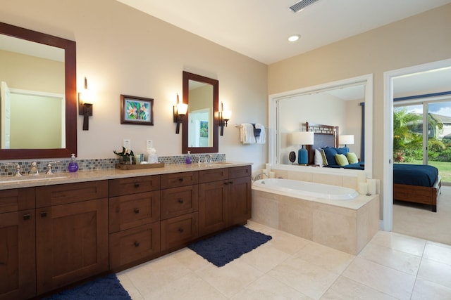 68-1122 Kaniku Dr Unit 426, Kamuela, HI 96743 - ensuite bathroom featuring double vanity, a bath, and tile patterned floors